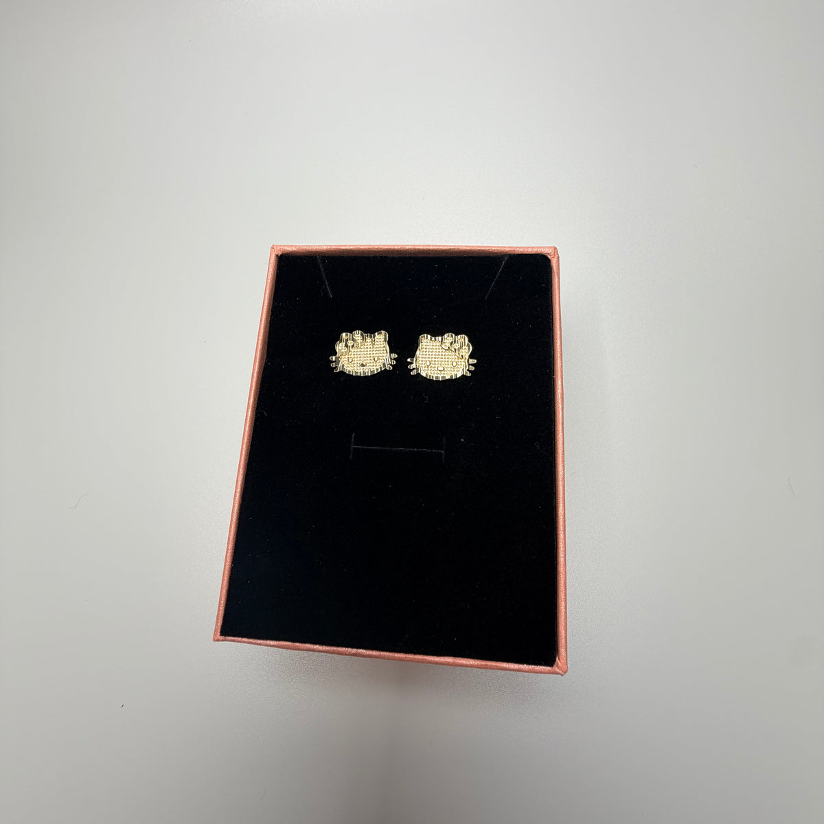 HK face earrings
